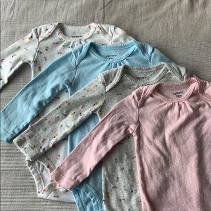 Carters 12M onesies - set of 4